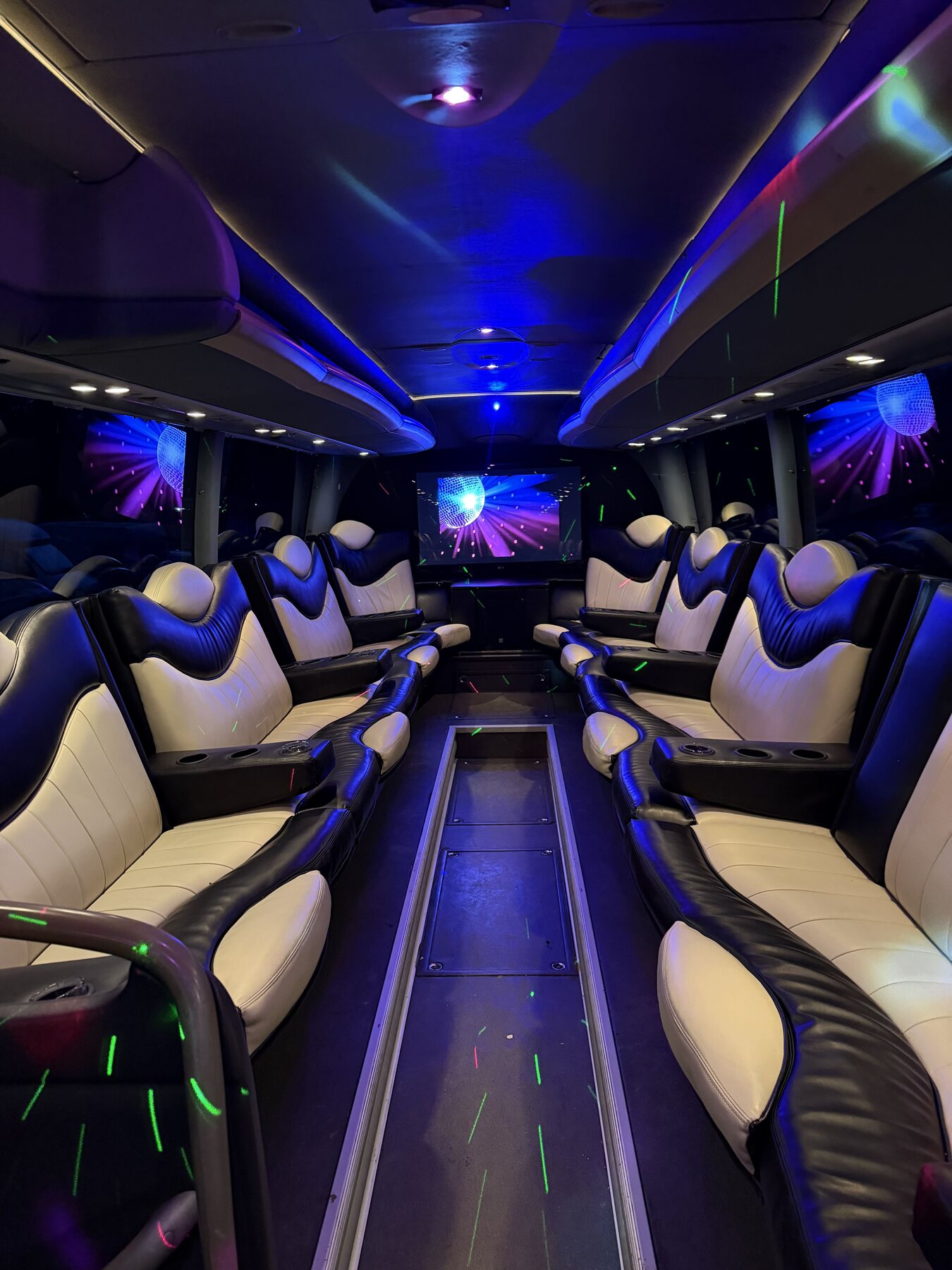 Premium party bus interior with ambient lighting